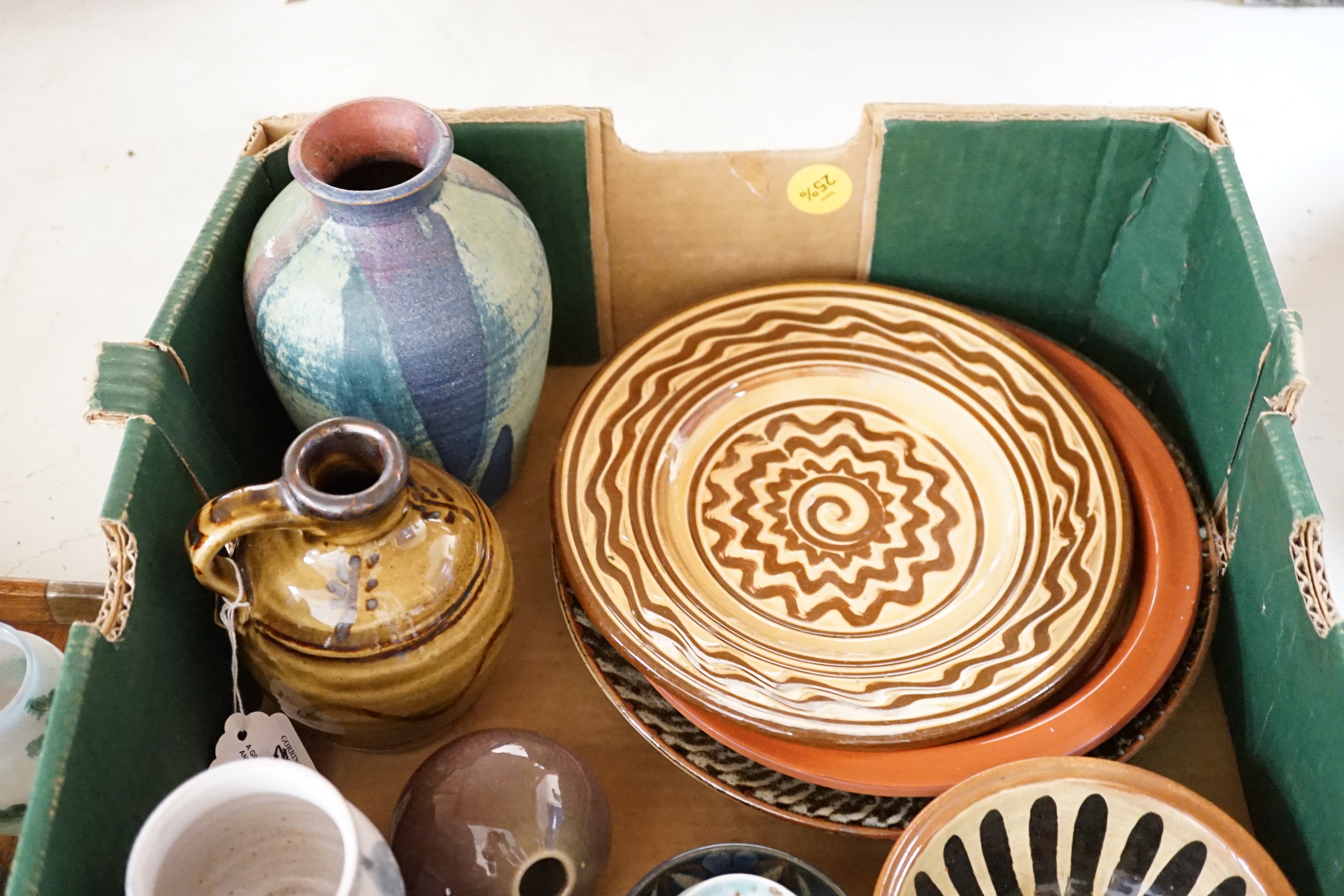 A group of European and Japanese studio pottery dishes, bowls and vases including a Boscastle R Irving plate, largest 26cm in diameter (17)